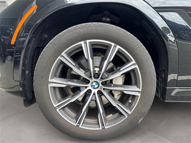 used 2023 BMW X6 car, priced at $56,192
