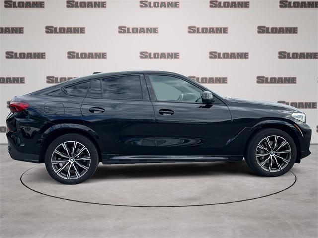 used 2023 BMW X6 car, priced at $56,192