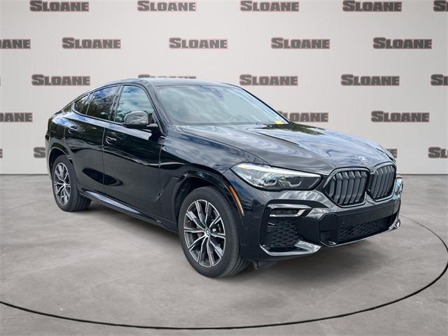 used 2023 BMW X6 car, priced at $56,192