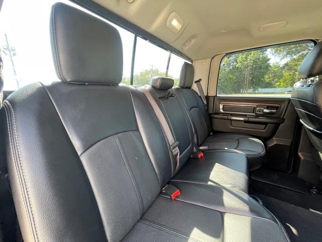 used 2018 Ram 1500 car, priced at $25,036