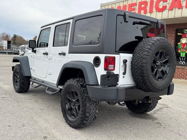 used 2015 Jeep Wrangler Unlimited car, priced at $16,154