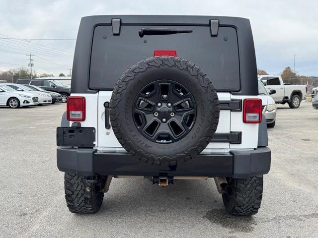 used 2015 Jeep Wrangler Unlimited car, priced at $16,154