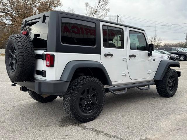 used 2015 Jeep Wrangler Unlimited car, priced at $16,154