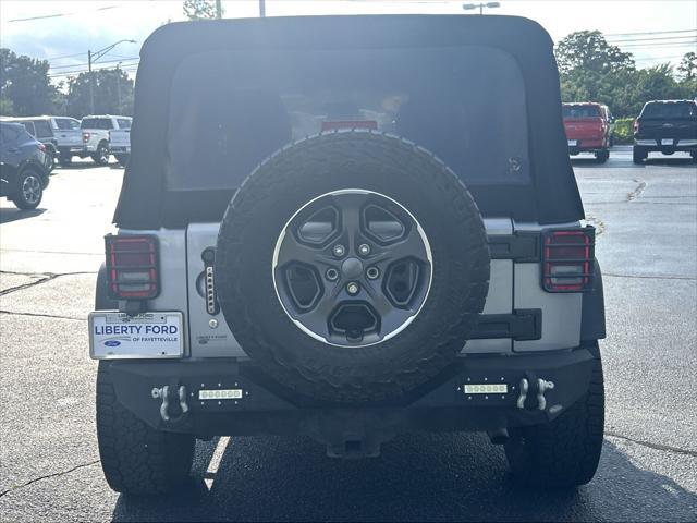 used 2016 Jeep Wrangler Unlimited car, priced at $13,839