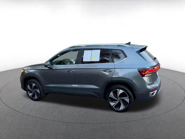 used 2025 Volkswagen Taos car, priced at $23,928