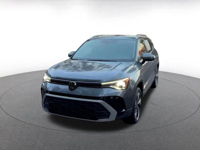 used 2025 Volkswagen Taos car, priced at $23,928