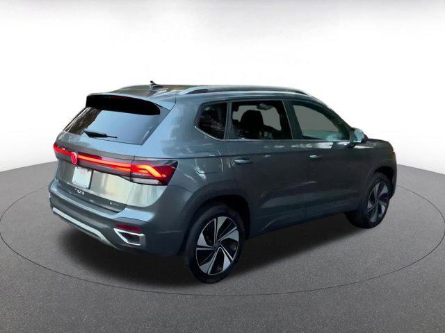 used 2025 Volkswagen Taos car, priced at $23,928