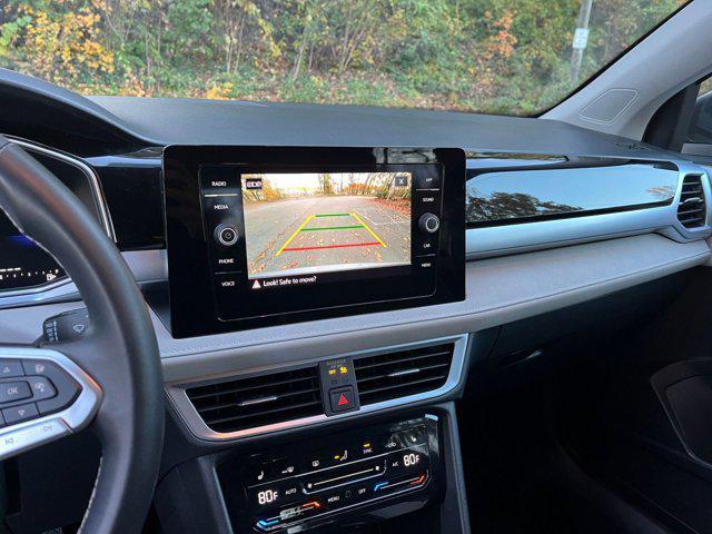 used 2025 Volkswagen Taos car, priced at $23,928