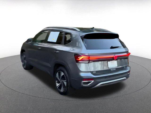 used 2025 Volkswagen Taos car, priced at $23,928