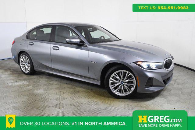 used 2023 BMW 330e car, priced at $31,298