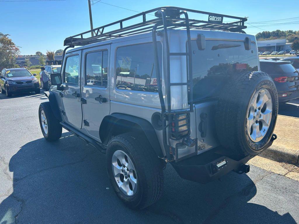 used 2014 Jeep Wrangler Unlimited car, priced at $15,475