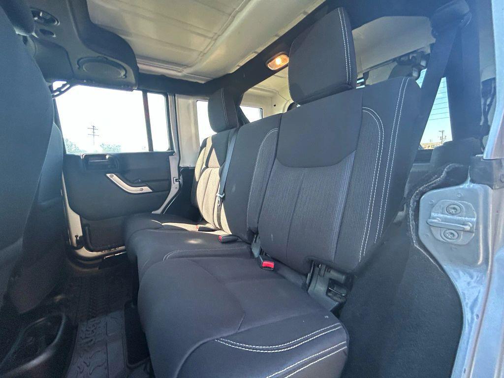 used 2014 Jeep Wrangler Unlimited car, priced at $15,475