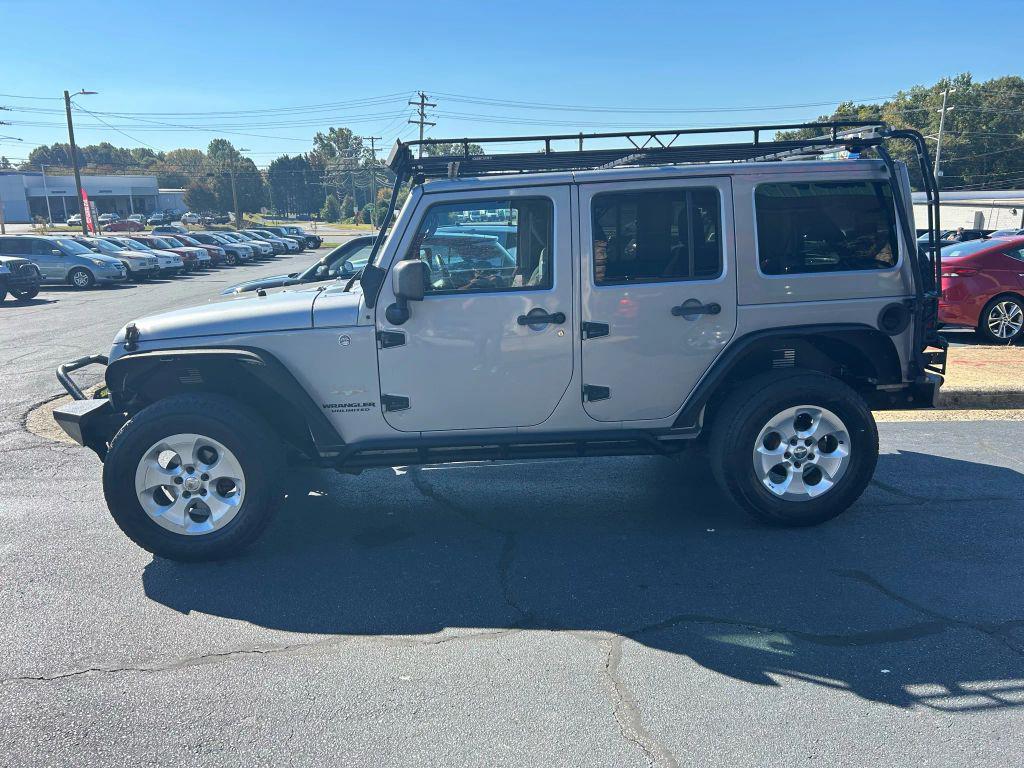 used 2014 Jeep Wrangler Unlimited car, priced at $15,475