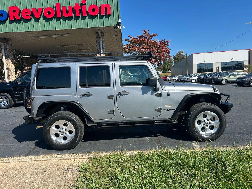 used 2014 Jeep Wrangler Unlimited car, priced at $15,475