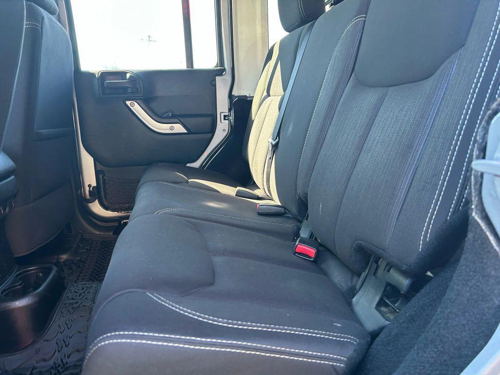 used 2014 Jeep Wrangler Unlimited car, priced at $15,475