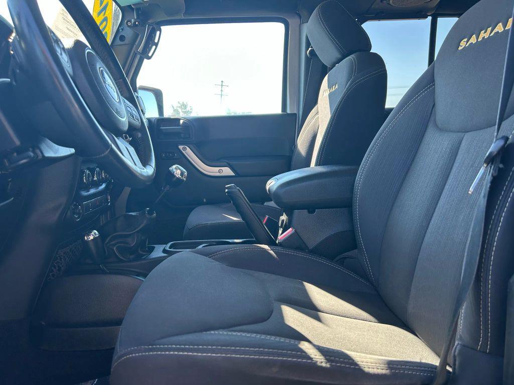 used 2014 Jeep Wrangler Unlimited car, priced at $15,475