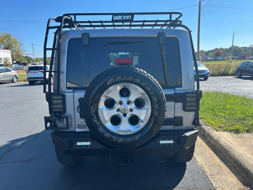 used 2014 Jeep Wrangler Unlimited car, priced at $15,475