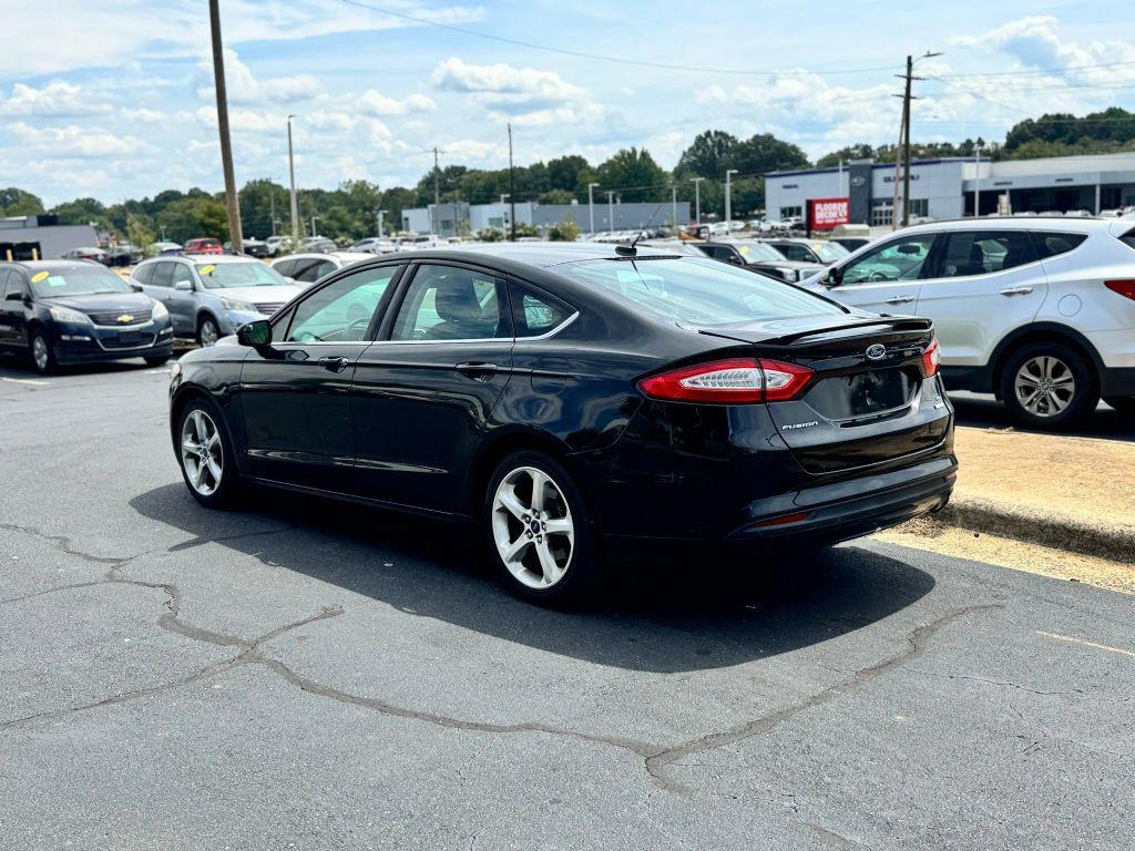 used 2016 Ford Fusion car, priced at $6,675