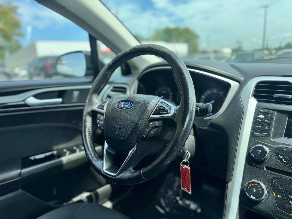 used 2016 Ford Fusion car, priced at $6,675