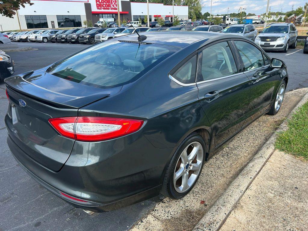 used 2016 Ford Fusion car, priced at $6,975