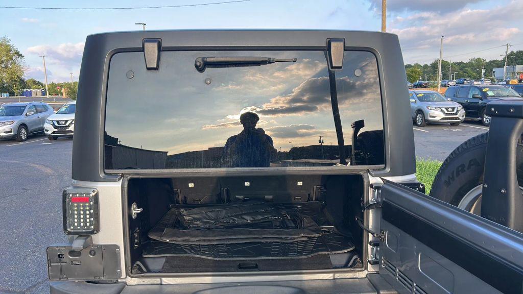 used 2014 Jeep Wrangler Unlimited car, priced at $16,475