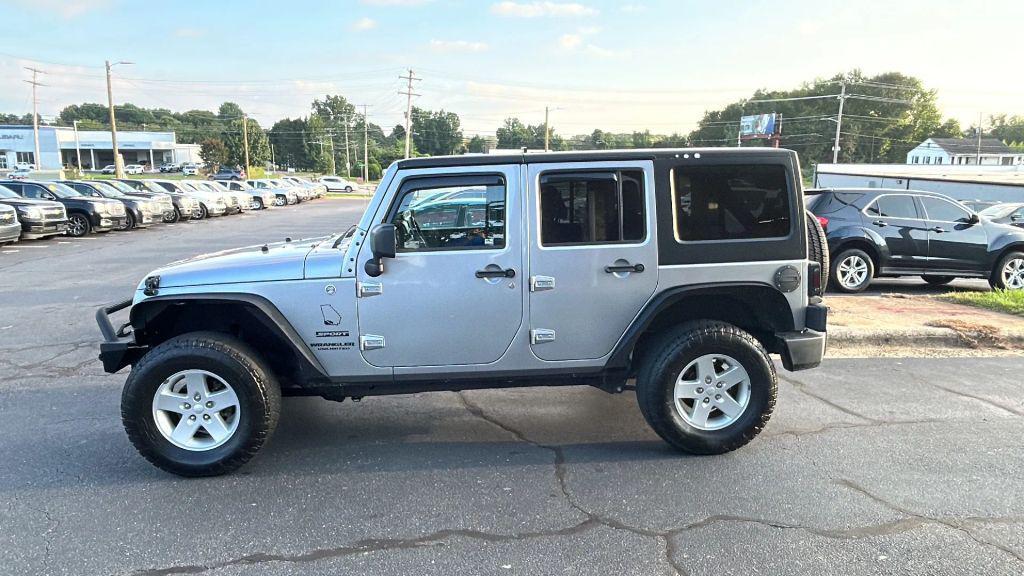 used 2014 Jeep Wrangler Unlimited car, priced at $16,475
