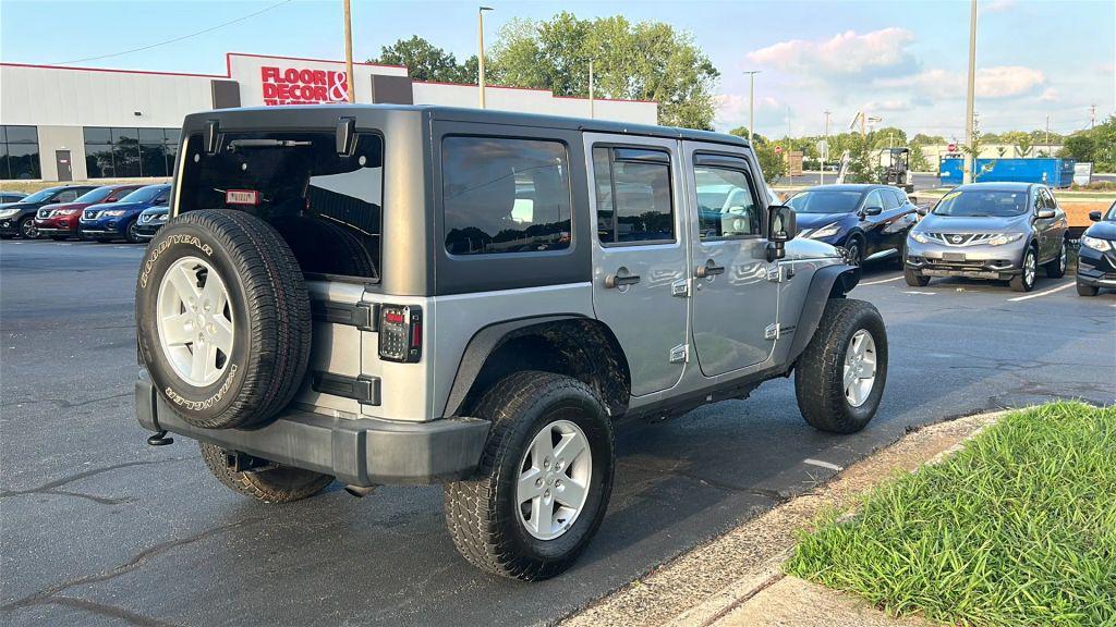 used 2014 Jeep Wrangler Unlimited car, priced at $16,475