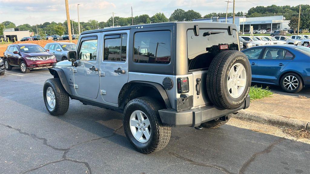 used 2014 Jeep Wrangler Unlimited car, priced at $16,475