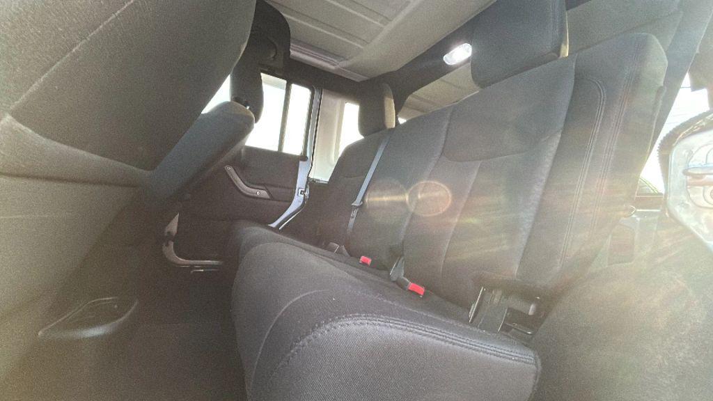 used 2014 Jeep Wrangler Unlimited car, priced at $16,475