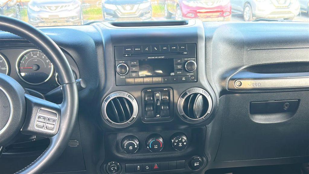 used 2014 Jeep Wrangler Unlimited car, priced at $16,475