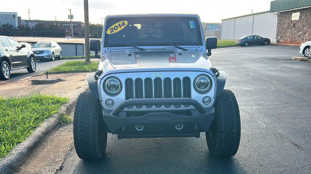 used 2014 Jeep Wrangler Unlimited car, priced at $16,475