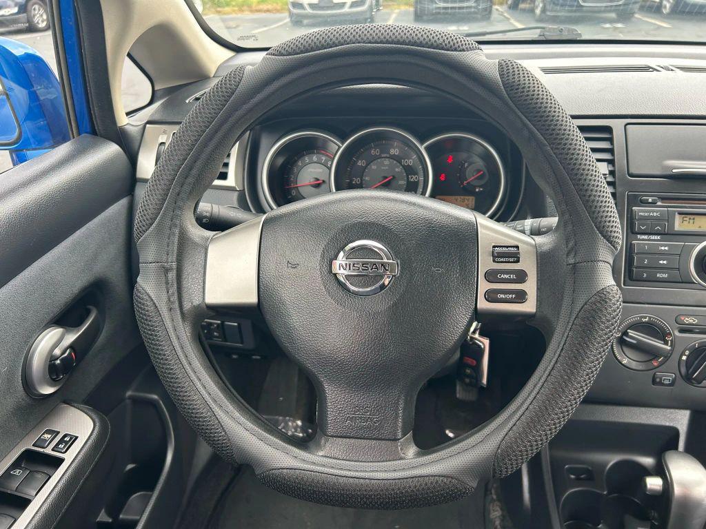 used 2009 Nissan Versa car, priced at $5,675