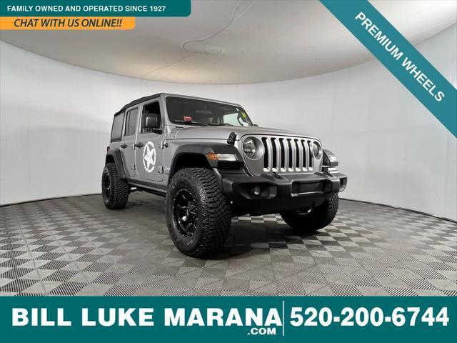 used 2018 Jeep Wrangler Unlimited car, priced at $23,573