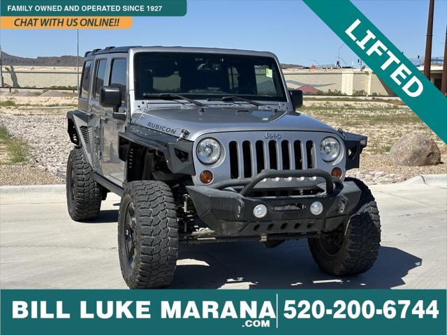 used 2015 Jeep Wrangler Unlimited car, priced at $27,475