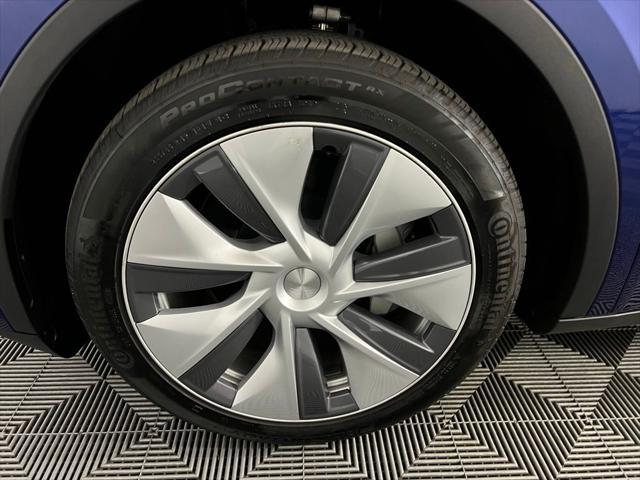 used 2024 Tesla Model Y car, priced at $35,673