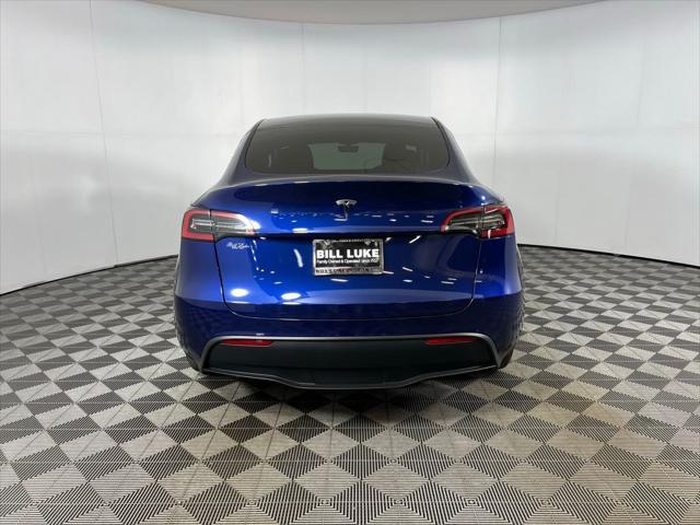 used 2024 Tesla Model Y car, priced at $35,673