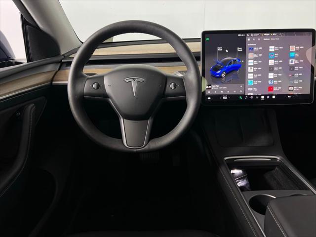 used 2024 Tesla Model Y car, priced at $35,673