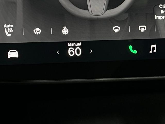 used 2024 Tesla Model Y car, priced at $35,673