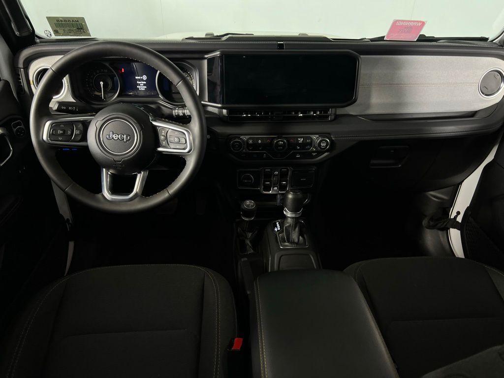used 2024 Jeep Wrangler 4xe car, priced at $29,873