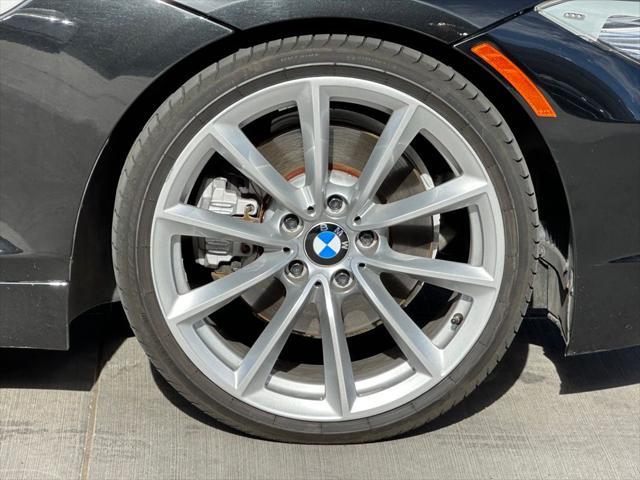 used 2011 BMW Z4 car, priced at $18,995