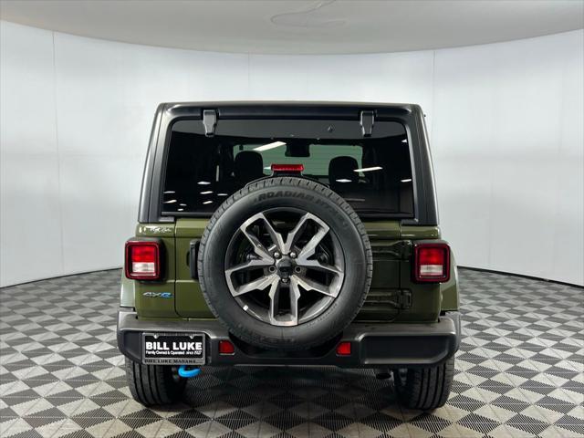 used 2024 Jeep Wrangler 4xe car, priced at $32,573