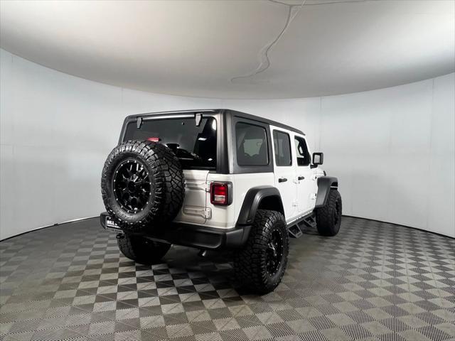 used 2021 Jeep Wrangler Unlimited car, priced at $31,973