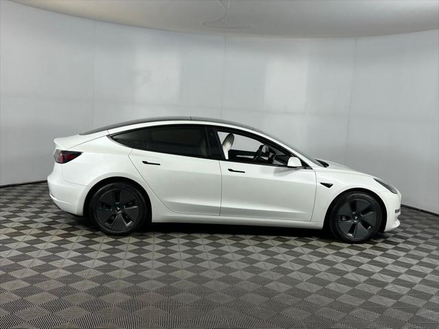 used 2023 Tesla Model 3 car, priced at $27,075