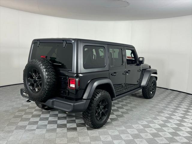 used 2021 Jeep Wrangler Unlimited car, priced at $31,473