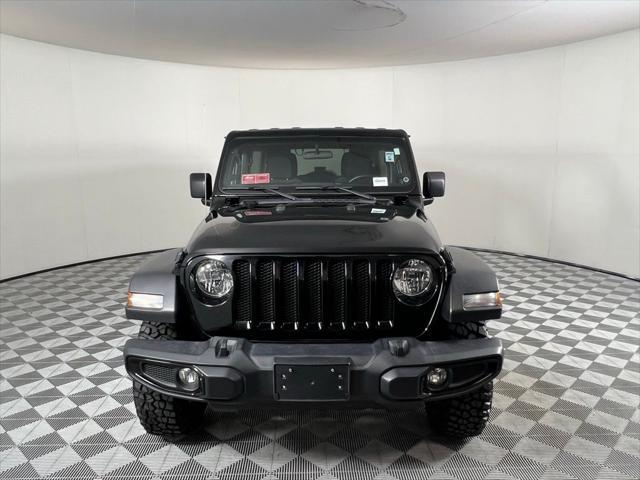 used 2021 Jeep Wrangler Unlimited car, priced at $31,473