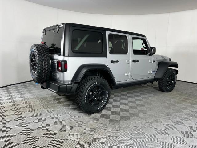 used 2023 Jeep Wrangler 4xe car, priced at $29,573