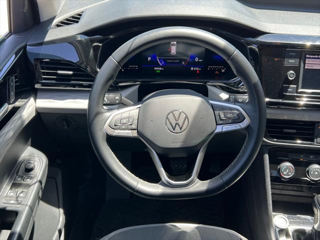 used 2023 Volkswagen Taos car, priced at $18,973