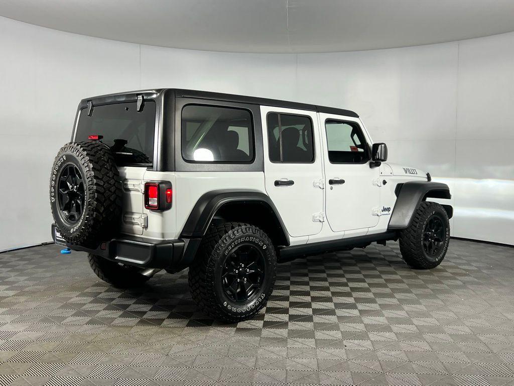 used 2023 Jeep Wrangler 4xe car, priced at $26,173