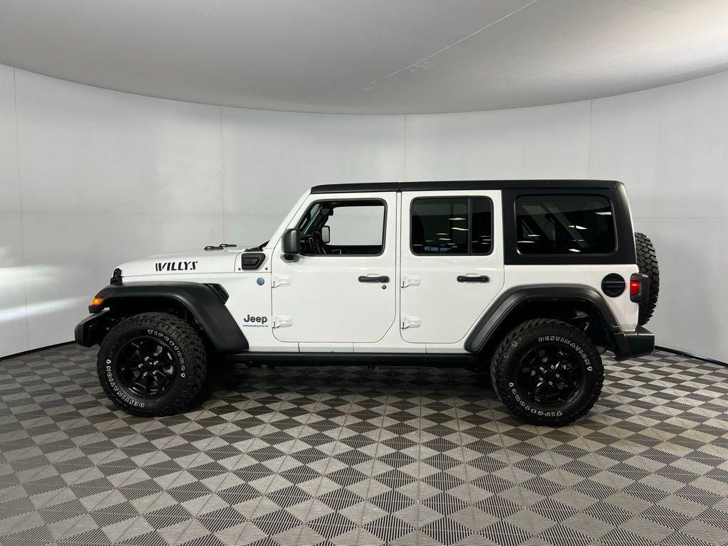 used 2023 Jeep Wrangler 4xe car, priced at $26,173