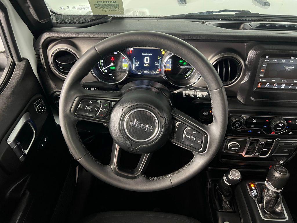 used 2023 Jeep Wrangler 4xe car, priced at $26,173